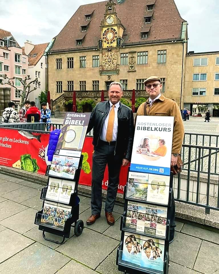 Public Bible teaching display in an outdoor city setting.